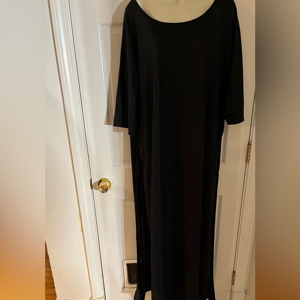 Long black scoop neck top with high side slits can be worn as dress or cover up